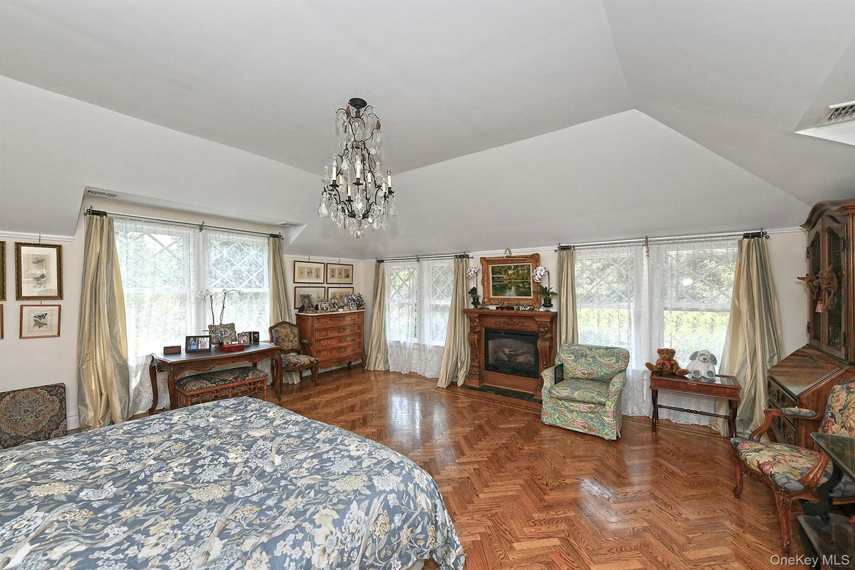 Bedroom, Chandelier, Fireplace, Interior, Wood Texture Flooring