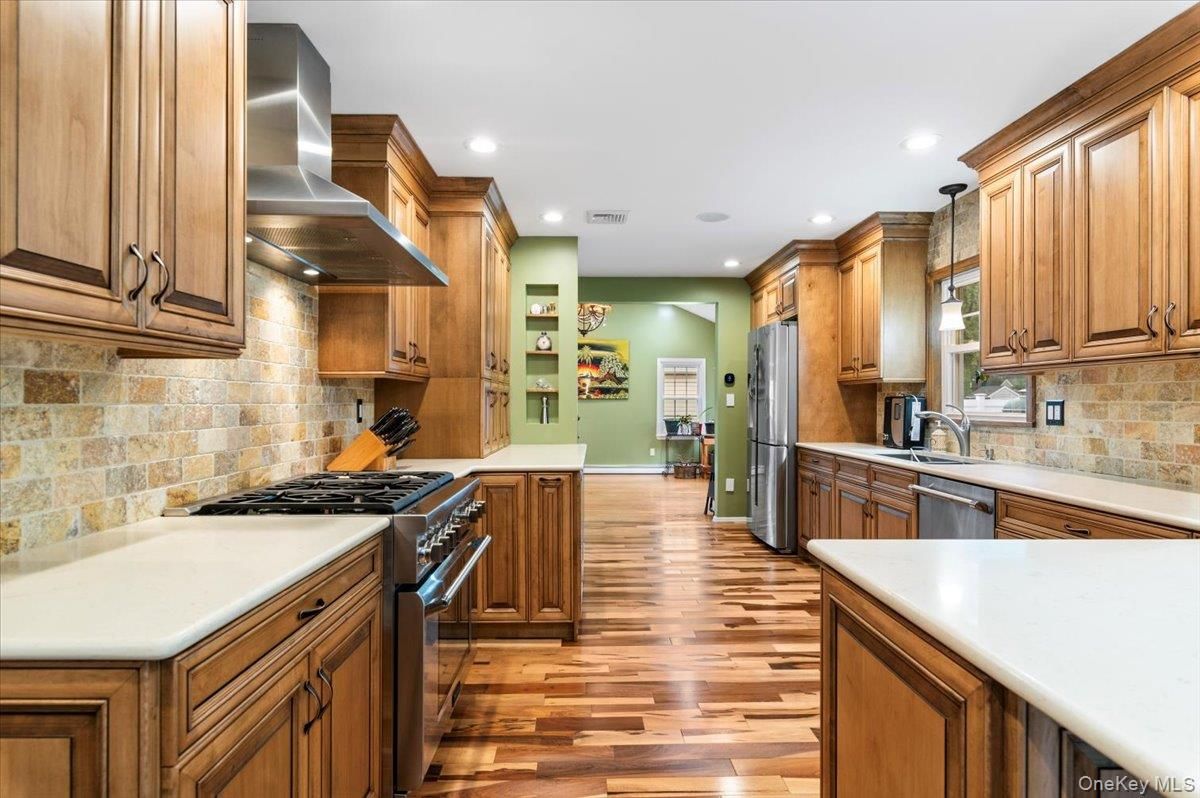 Interior, Kitchen, Recessed Lighting, Stainless Steel Appliances, Stone Walls, Wood Texture Flooring