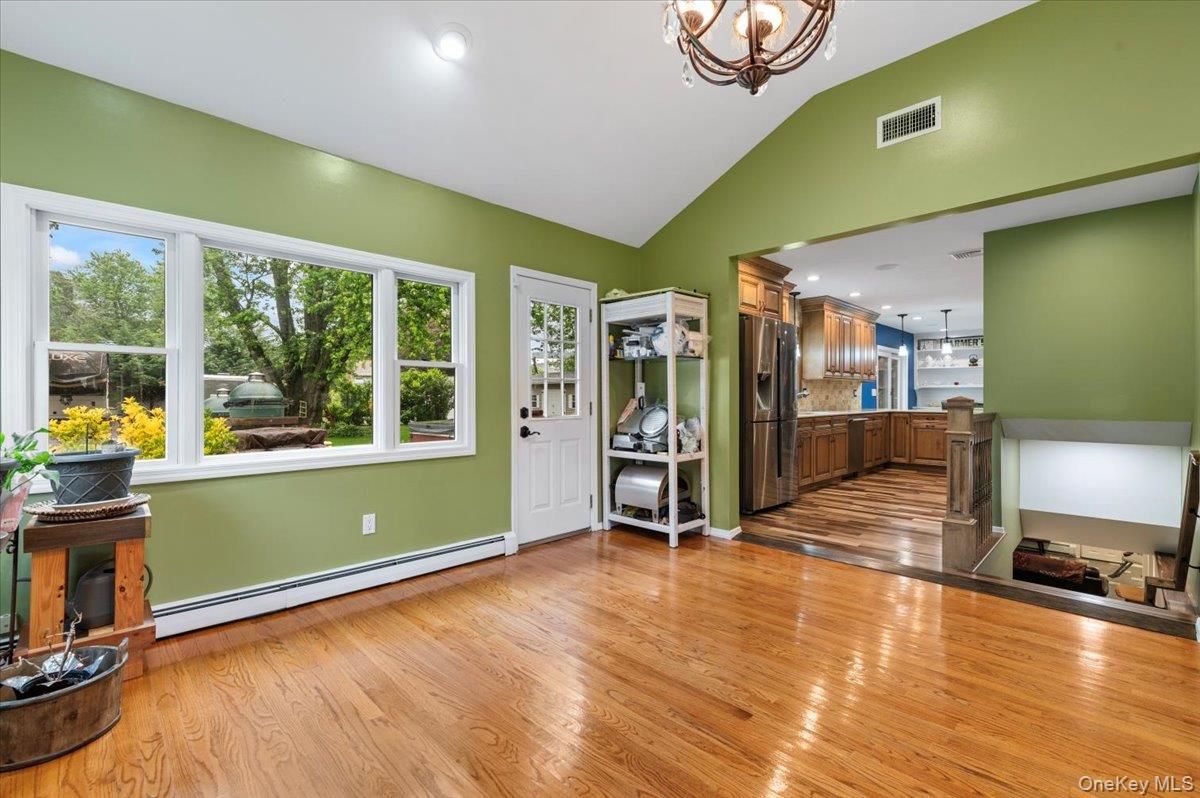 Chandelier, Interior, Kitchen, Pendant Lights, Recessed Lighting, Stainless Steel Appliances, Wood Texture Flooring