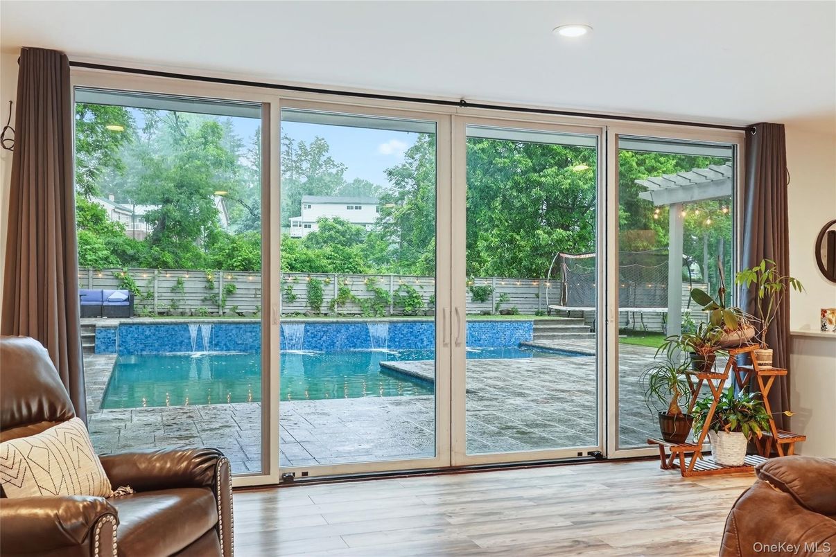 Interior, Pool, Recessed Lighting, Sun Room, Wood Texture Flooring