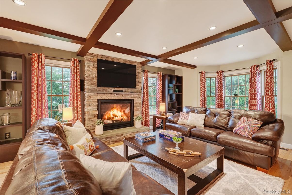 Fireplace, Interior, Living room, Recessed Lighting, Stone Walls, Wooden Beams, Wood Texture Flooring