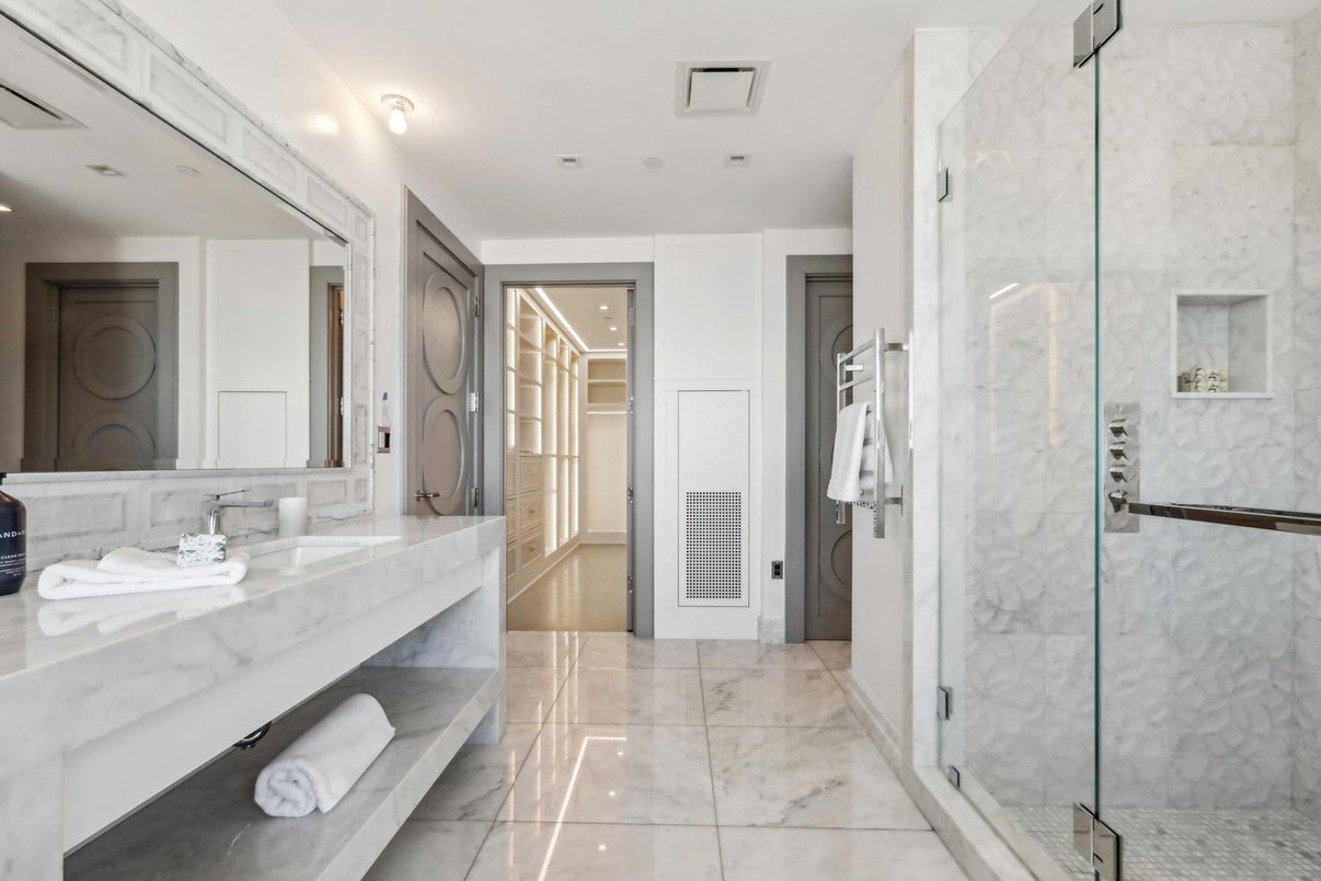 Bathroom, Dual Sink Vanities, Glass Shower, Interior, Marble Walls, Recessed Lighting