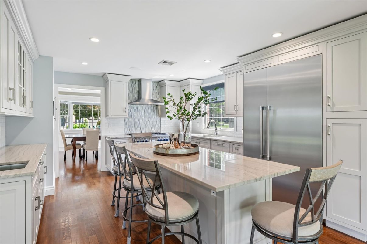 Dining room, Interior, Kitchen, Recessed Lighting, Stainless Steel Appliances, Wood Texture Flooring