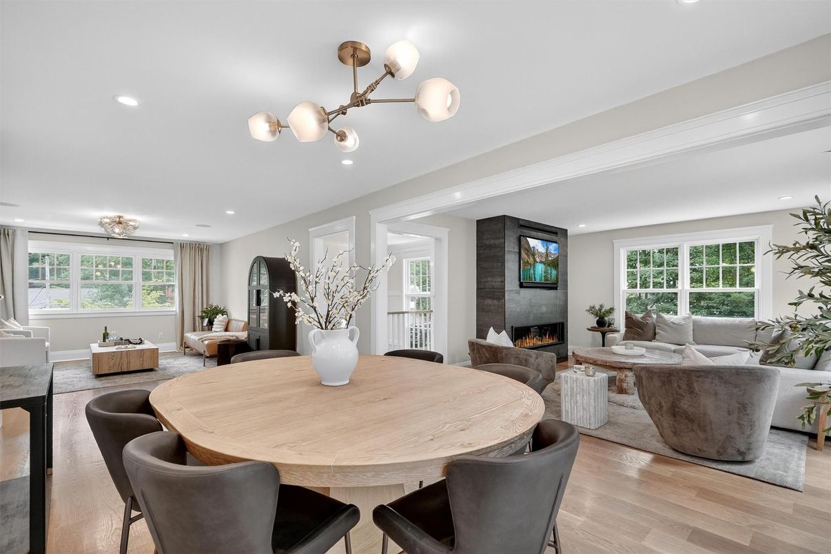 Dining room, Fireplace, Interior, Living room, Recessed Lighting, Wood Texture Flooring