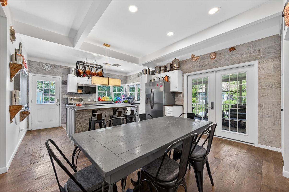 Dining room, Interior, Kitchen, Pendant Lights, Recessed Lighting, Stainless Steel Appliances, Wood Texture Flooring