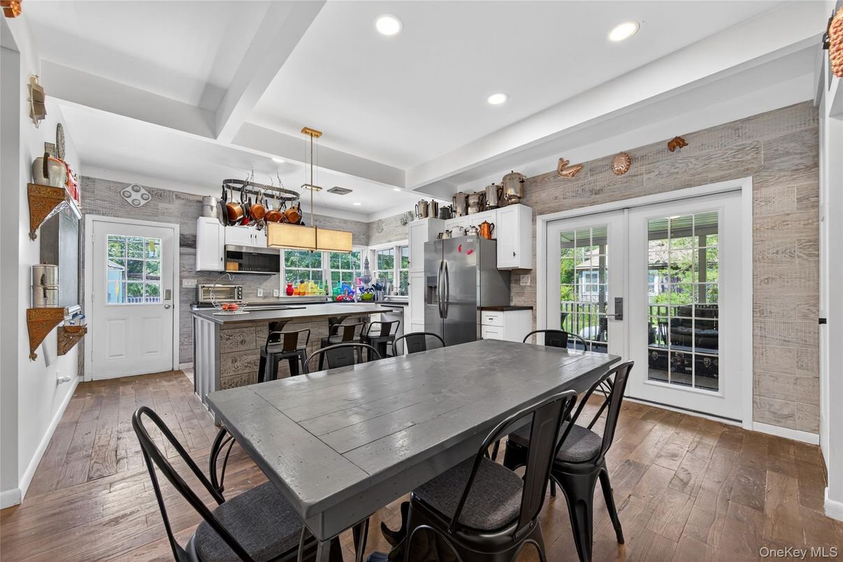 Dining room, Interior, Kitchen, Pendant Lights, Recessed Lighting, Stainless Steel Appliances, Wood Texture Flooring