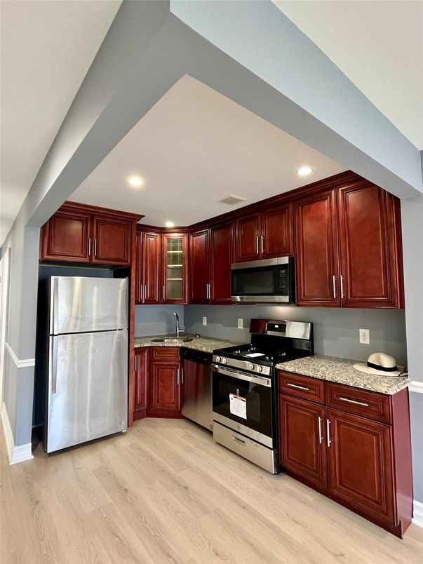 Interior, Kitchen, Recessed Lighting, Stainless Steel Appliances, Wood Texture Flooring