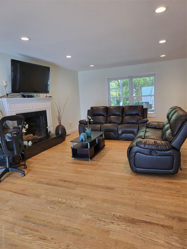Fireplace, Interior, Living room, Recessed Lighting, Wood Texture Flooring