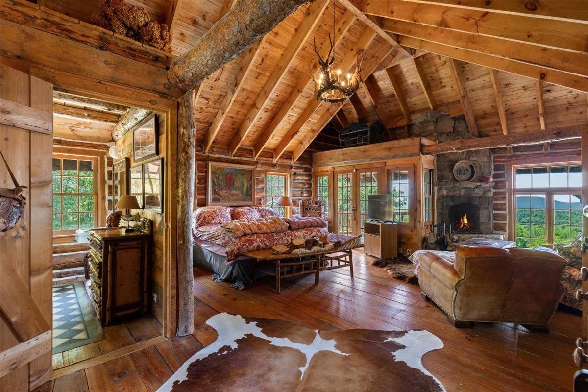 Bedroom, Chandelier, Fireplace, Interior, Living room, Wooden Beams, Wooden Ceilings, Wood Texture Flooring, Wooden Walls