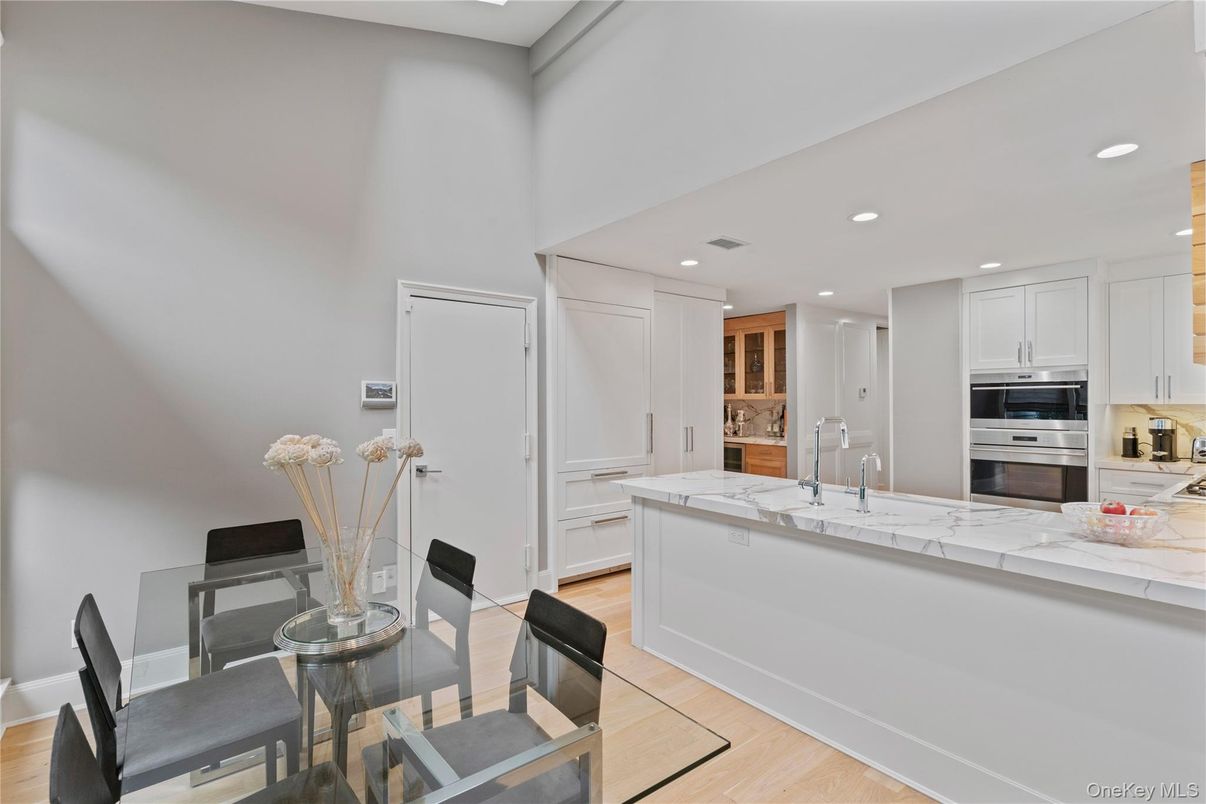 Dining room, Interior, Kitchen, Recessed Lighting, Stainless Steel Appliances, Wood Texture Flooring