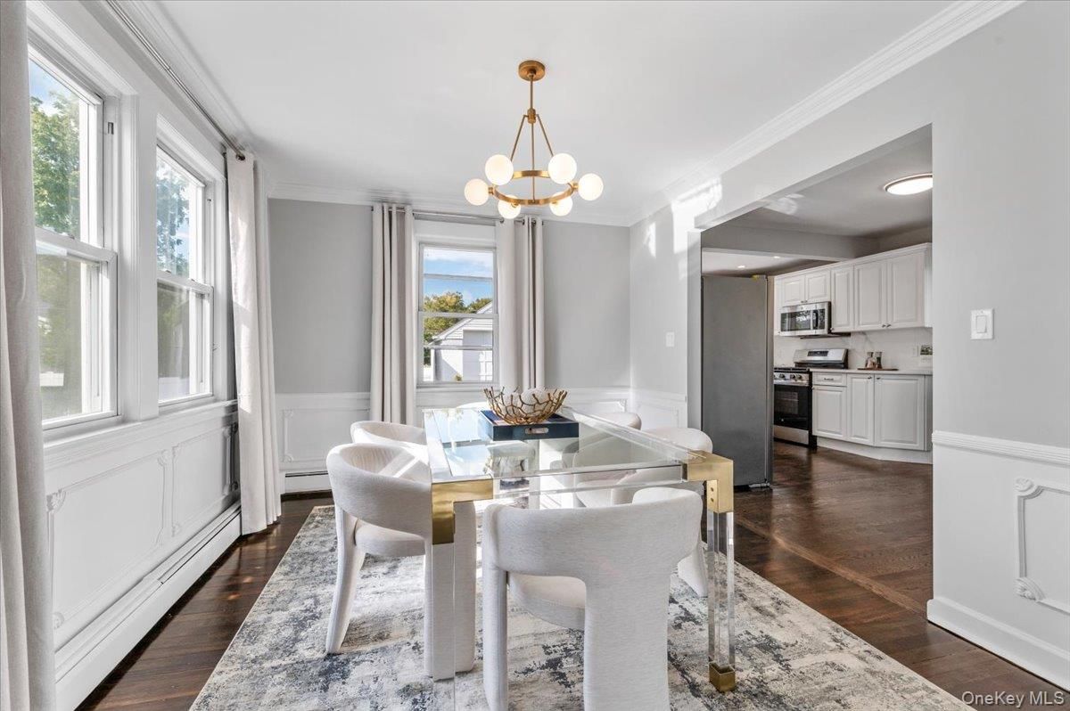 Chandelier, Dining room, Interior, Kitchen, Pendant Lights, Stainless Steel Appliances, Wood Texture Flooring