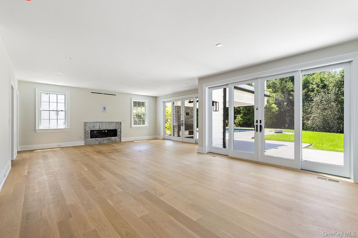 Empty room, Fireplace, Interior, Recessed Lighting, Wood Texture Flooring