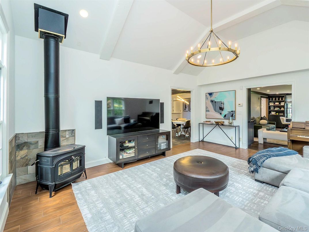 Chandelier, Fireplace, Interior, Living room, Recessed Lighting, Wood Texture Flooring