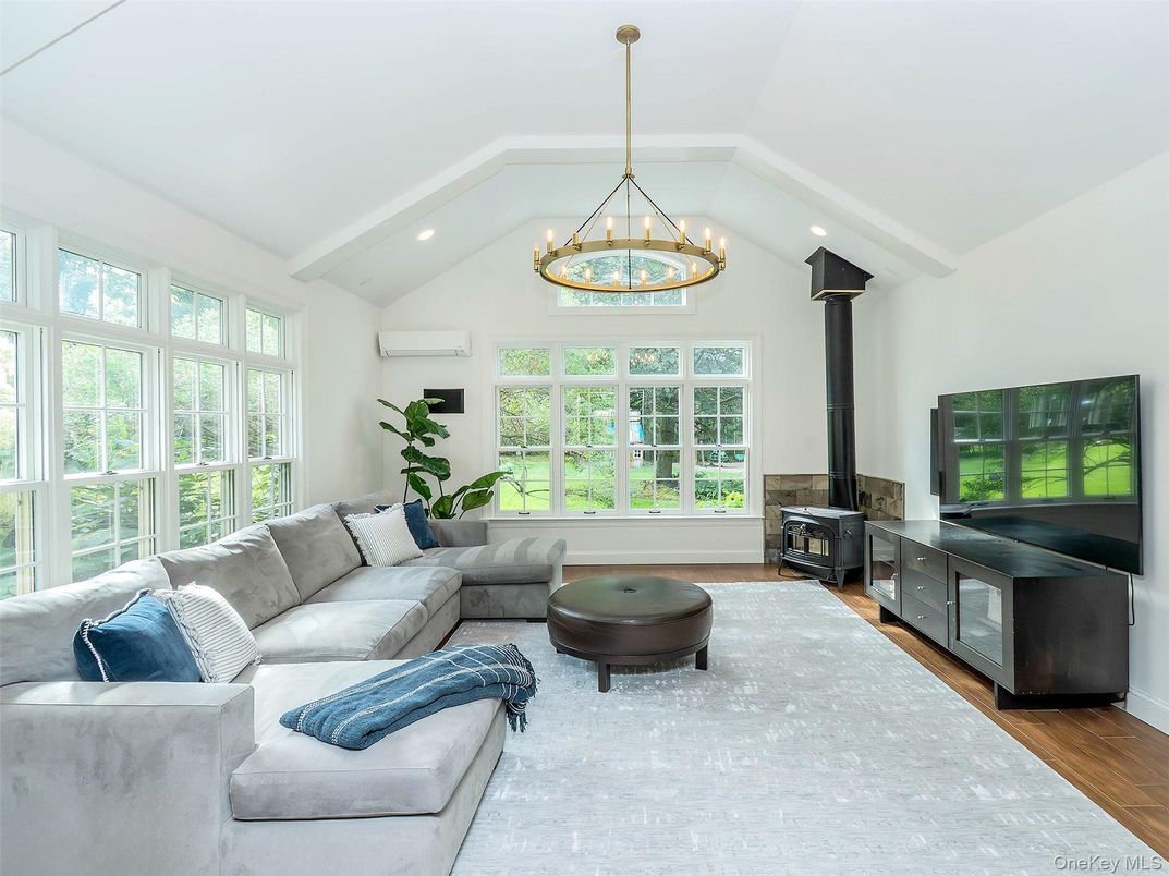 Chandelier, Fireplace, Interior, Living room, Recessed Lighting, Wood Texture Flooring