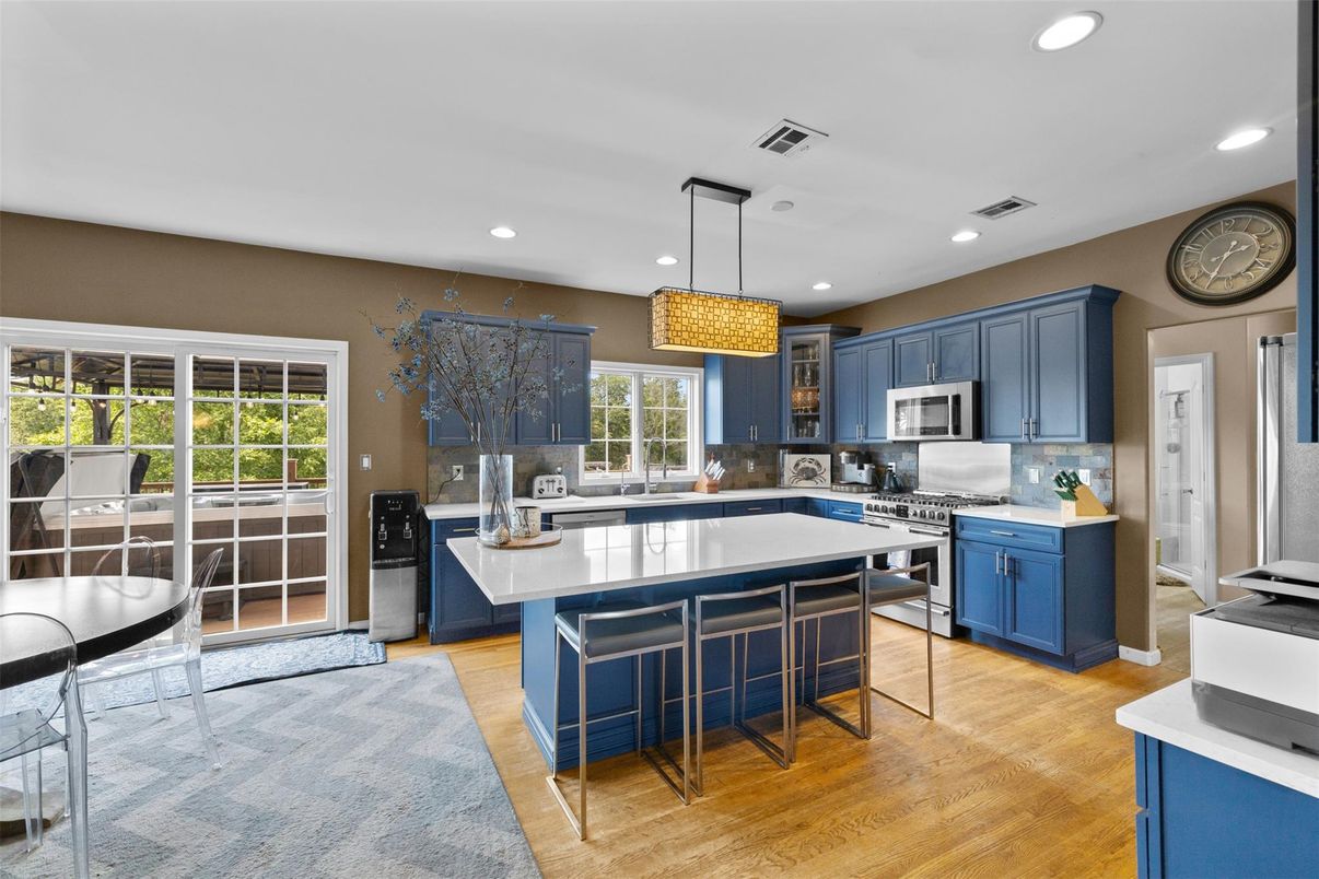 Chandelier, Interior, Kitchen, Pendant Lights, Recessed Lighting, Stainless Steel Appliances, Wood Texture Flooring