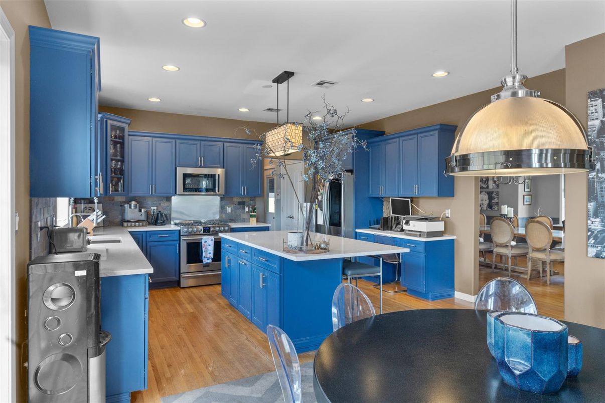 Dining room, Interior, Kitchen, Pendant Lights, Recessed Lighting, Stainless Steel Appliances, Wood Texture Flooring