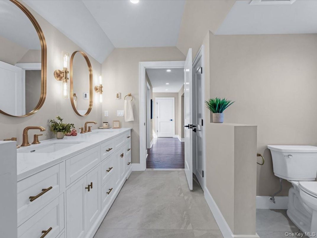 Bathroom, Dual Sink Vanities, Interior, Recessed Lighting, Wood Texture Flooring