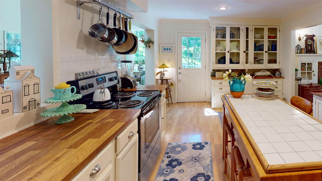 Interior, Kitchen, Recessed Lighting, Tile Countertops, Wood Texture Flooring