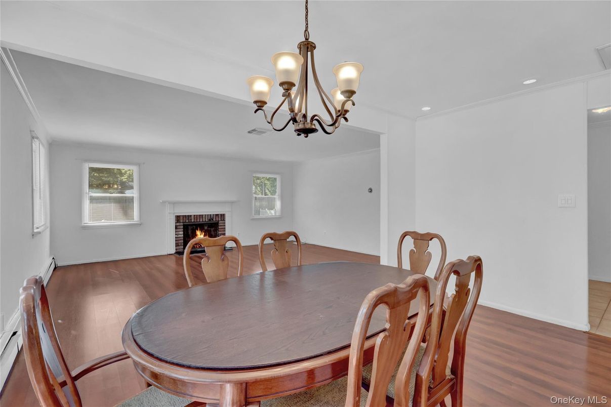 Chandelier, Dining room, Fireplace, Interior, Recessed Lighting, Wood Texture Flooring