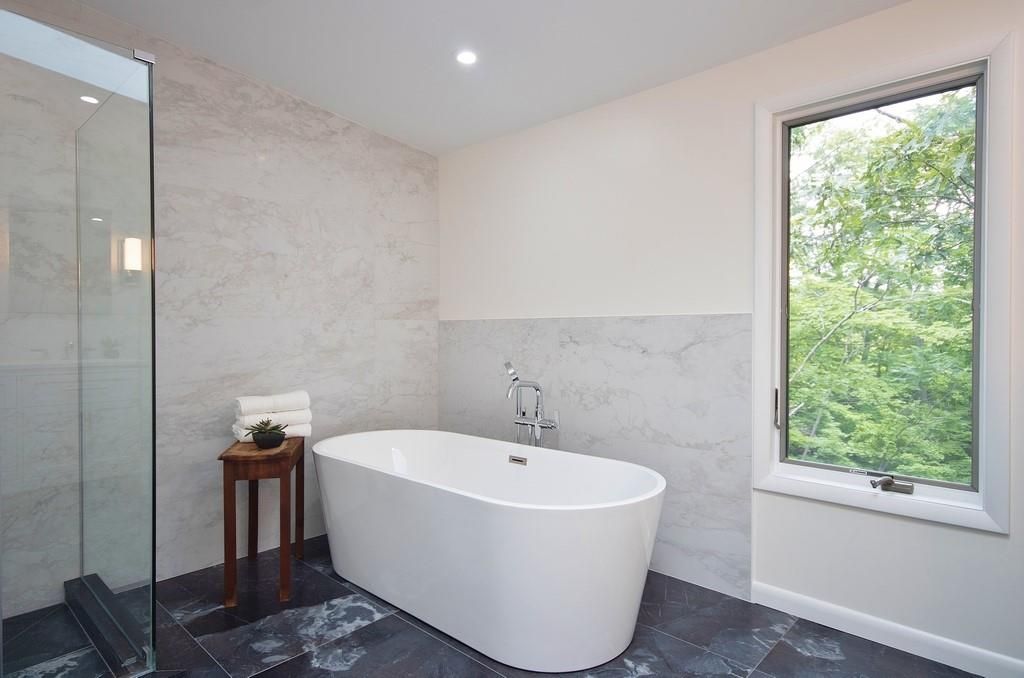 Bathroom, Free Standing Baths, Glass Shower, Interior, Marble Walls, Recessed Lighting