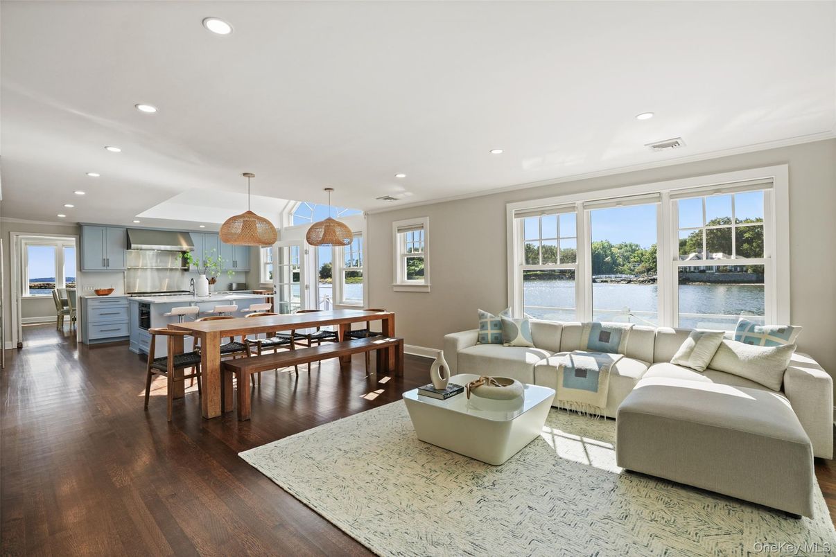 Dining room, Interior, Kitchen, Living room, Pendant Lights, Recessed Lighting, Stainless Steel Appliances, Water, Wood Texture Flooring