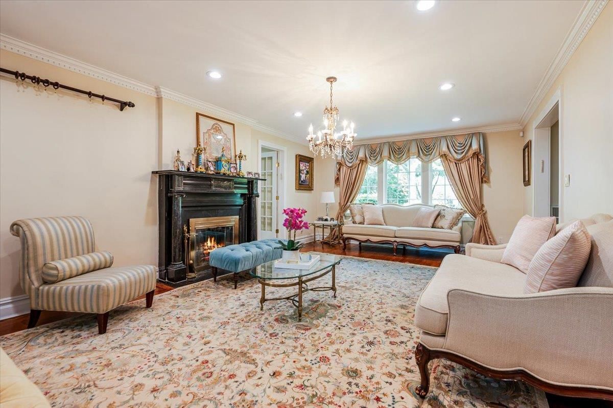 Chandelier, Fireplace, Interior, Living room, Recessed Lighting, Wood Texture Flooring