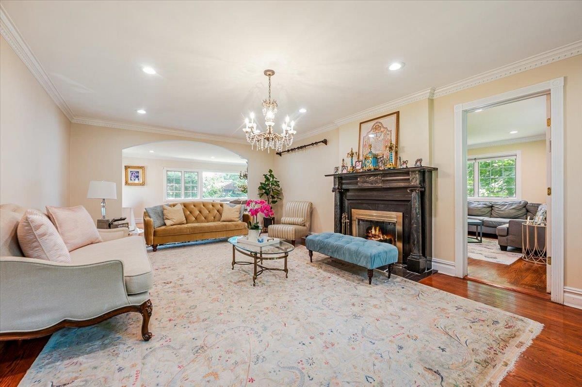 Chandelier, Fireplace, Interior, Living room, Recessed Lighting, Wood Texture Flooring