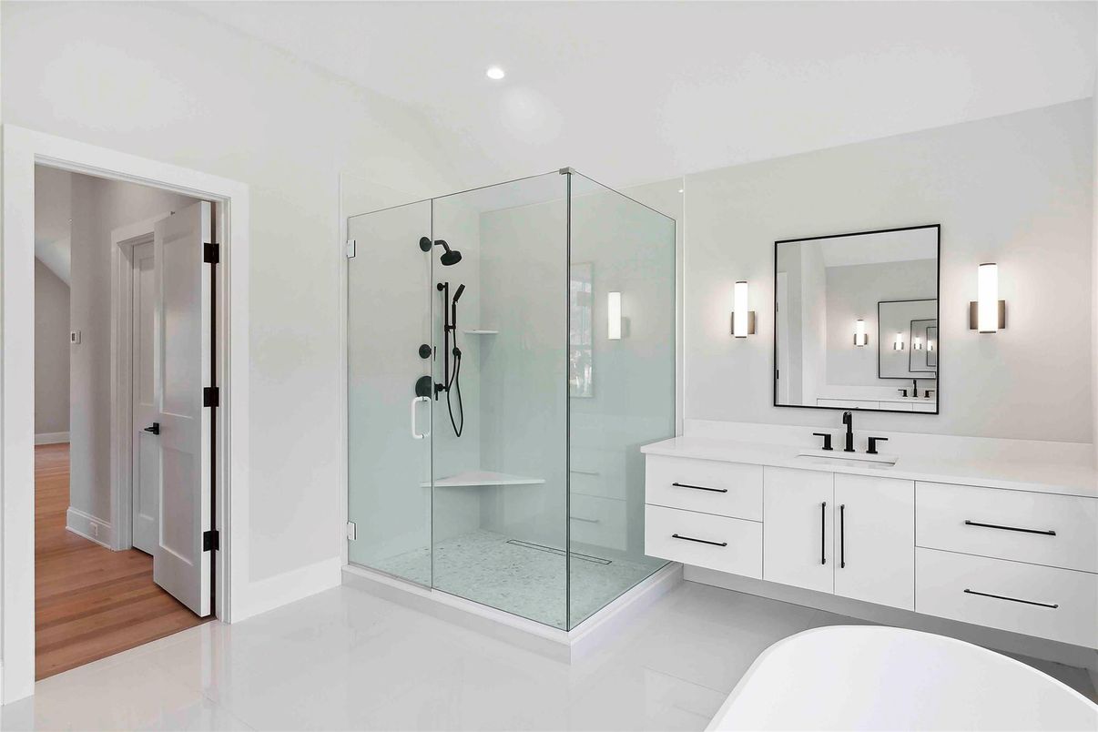 Bathroom, Dual Sink Vanities, Glass Shower, Interior, Recessed Lighting, Wood Texture Flooring