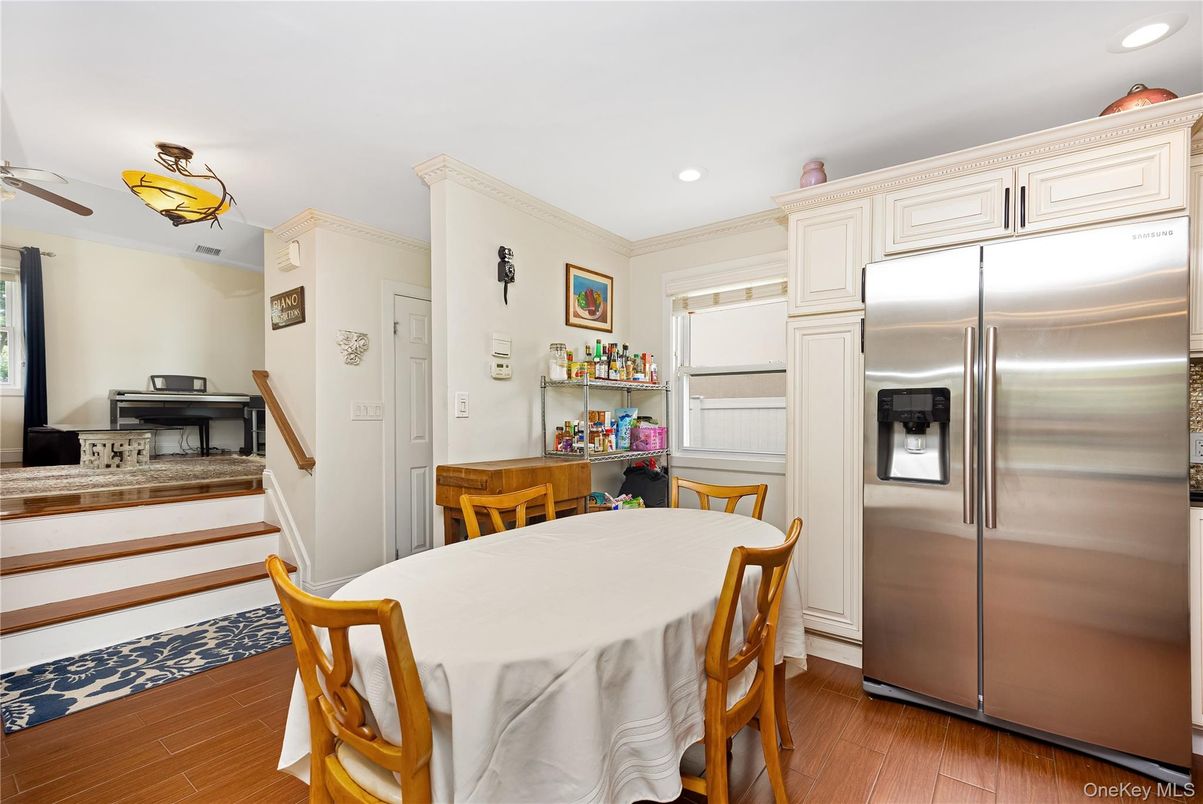 Dining room, Interior, Kitchen, Recessed Lighting, Stainless Steel Appliances, Wood Texture Flooring