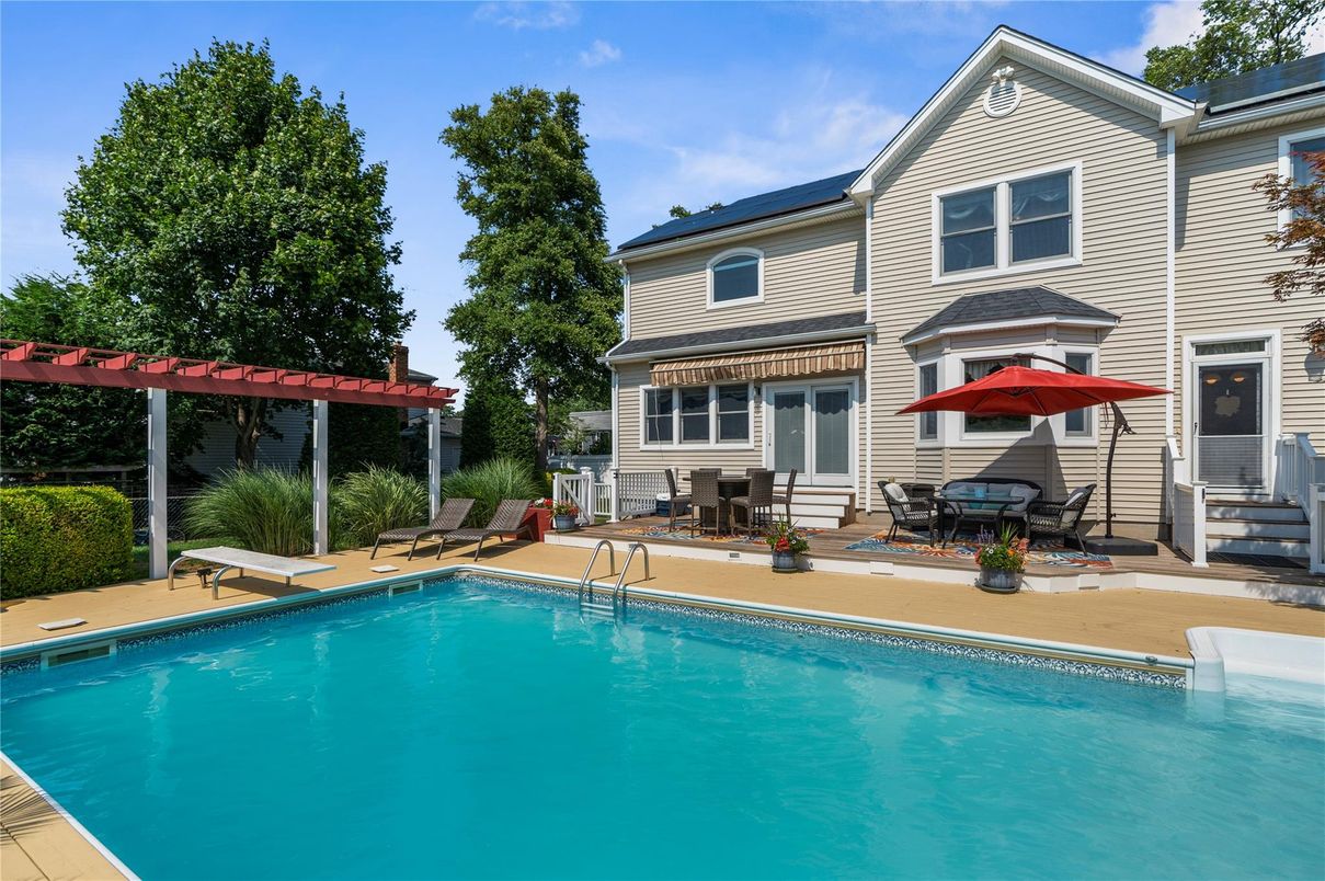 Exterior, Pool, Solar Panels