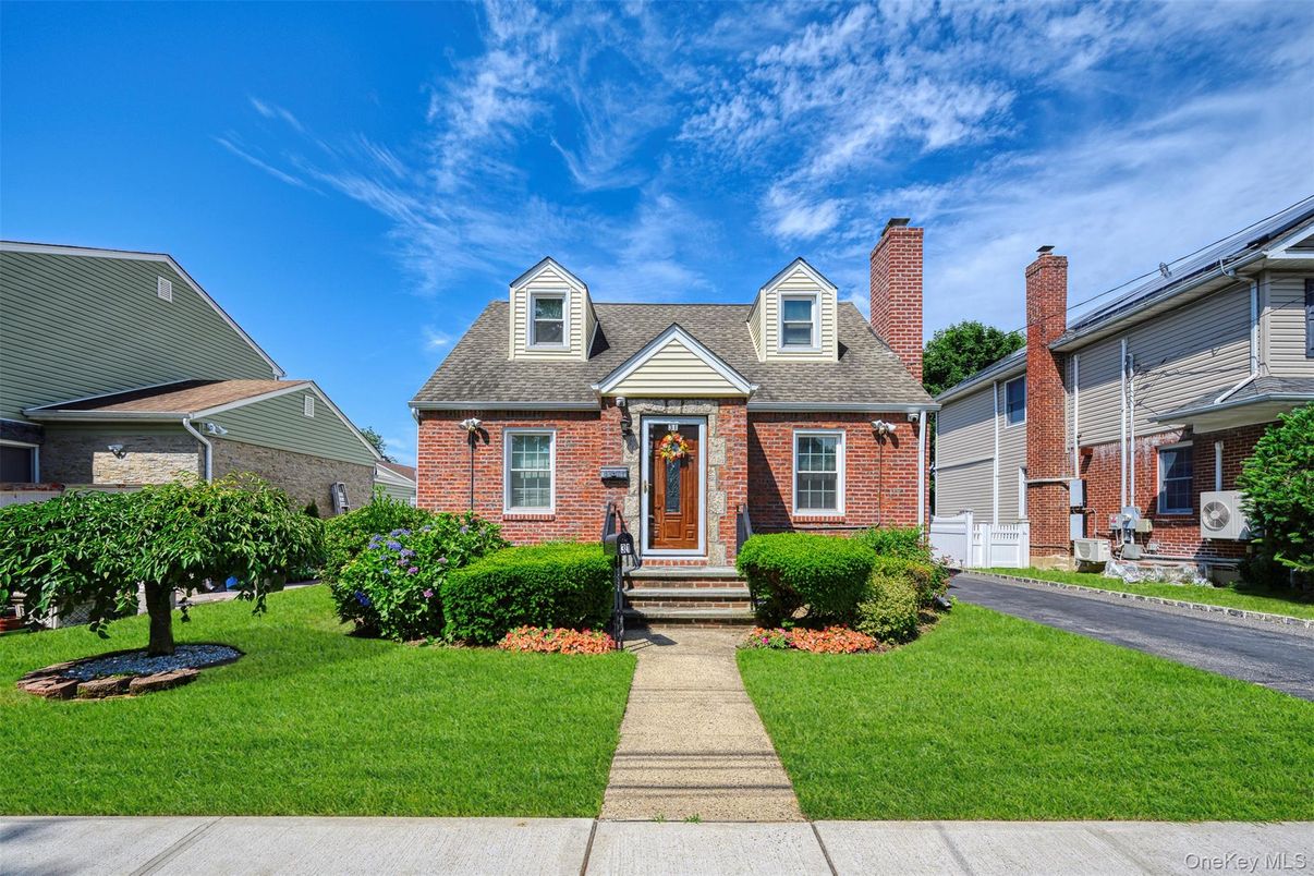 Exterior, Facade, Brick Facade, Cape Cod