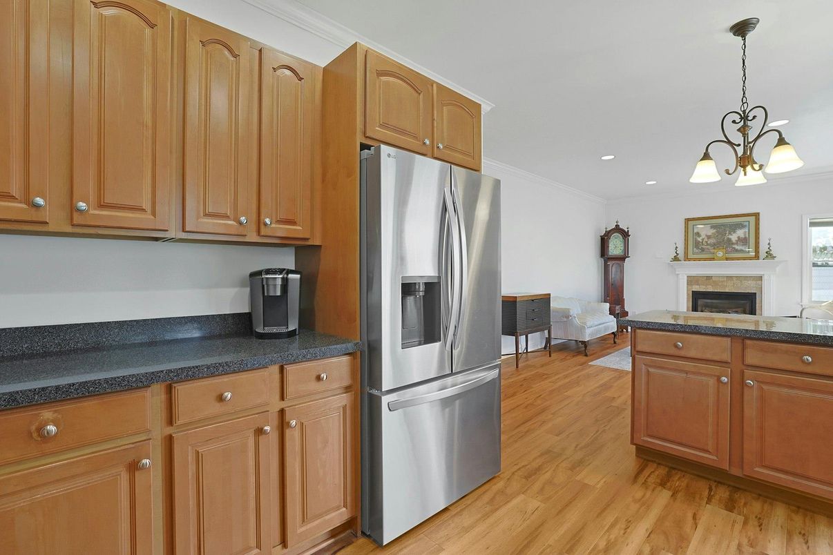 Fireplace, Interior, Kitchen, Pendant Lights, Recessed Lighting, Stainless Steel Appliances, Wood Texture Flooring