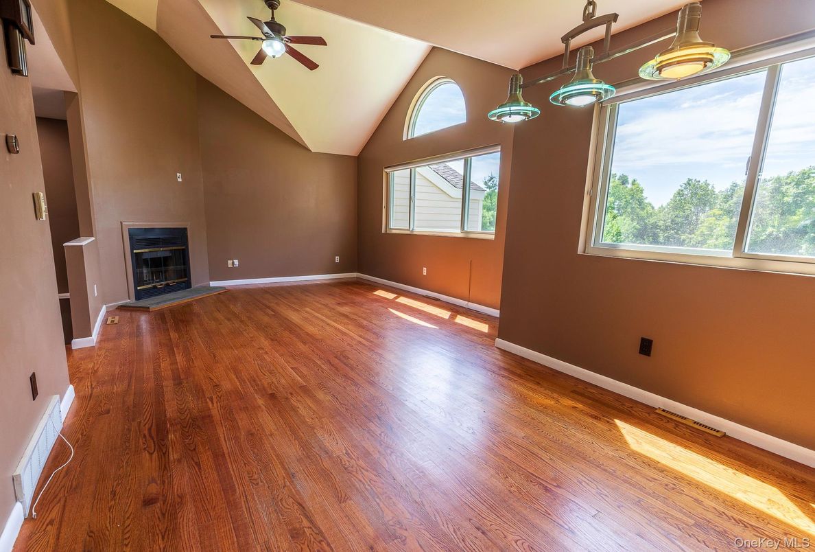 Empty room, Fireplace, Interior, Pendant Lights, Wood Texture Flooring