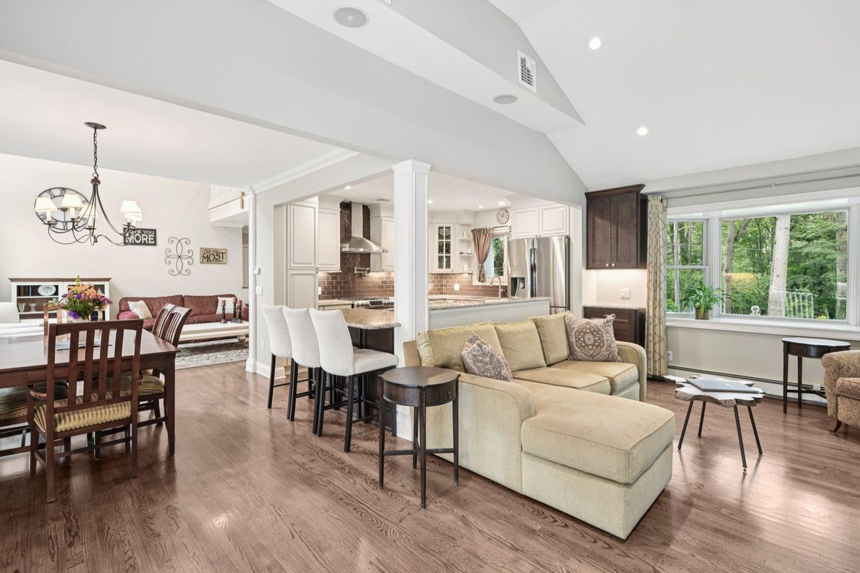 Chandelier, Dining room, Interior, Kitchen, Living room, Recessed Lighting, Stainless Steel Appliances, Wood Texture Flooring