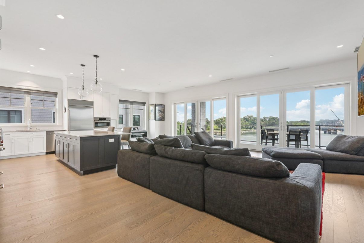 Interior, Kitchen, Living room, Pendant Lights, Recessed Lighting, Stainless Steel Appliances, Water, Wood Texture Flooring
