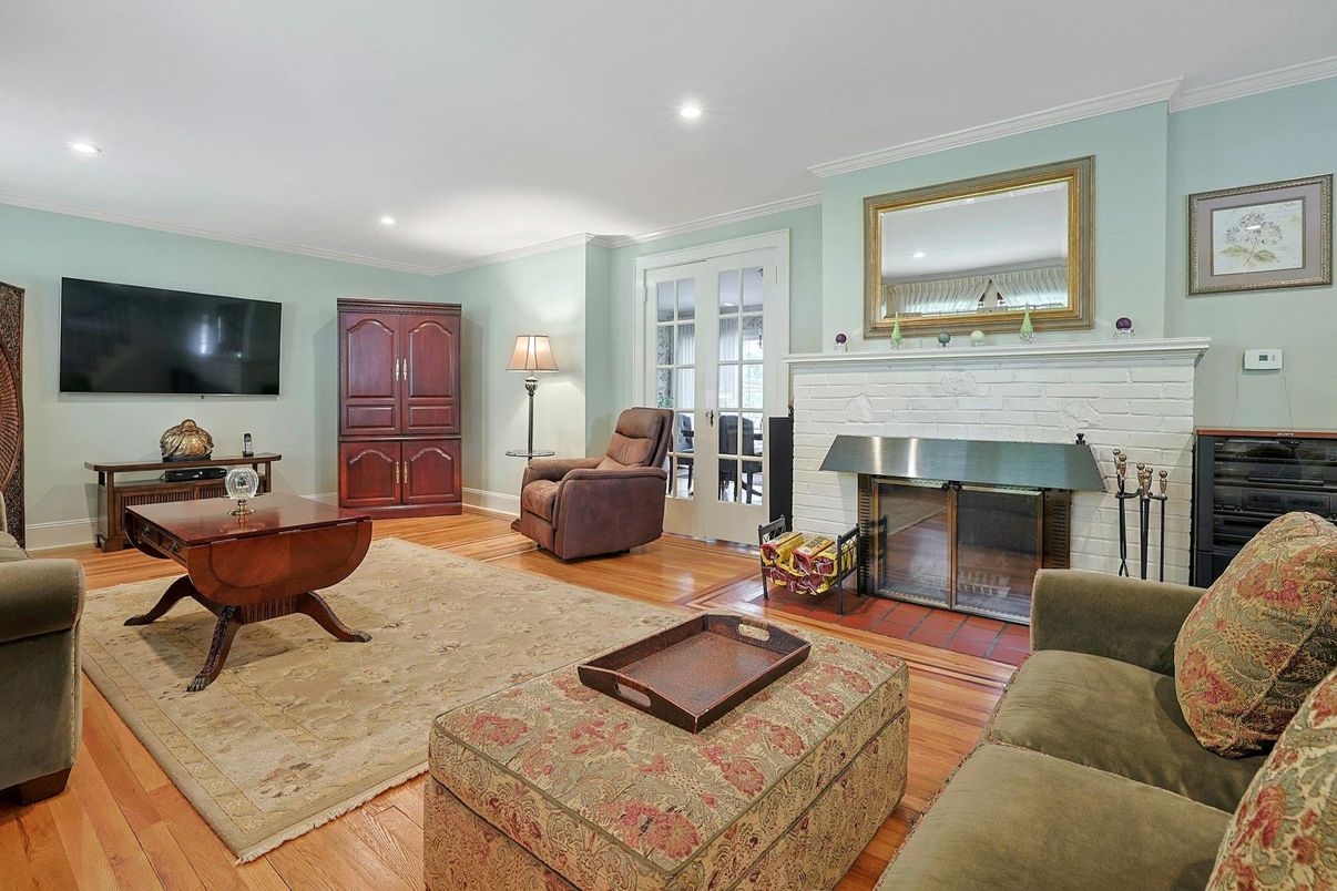 Fireplace, Interior, Living room, Piano, Recessed Lighting, Wood Texture Flooring