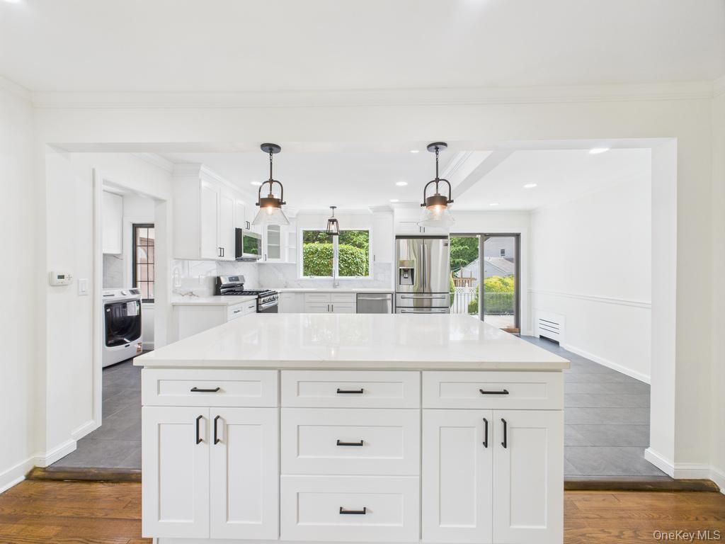 Interior, Kitchen, Pendant Lights, Recessed Lighting, Stainless Steel Appliances, Washer, Wood Texture Flooring