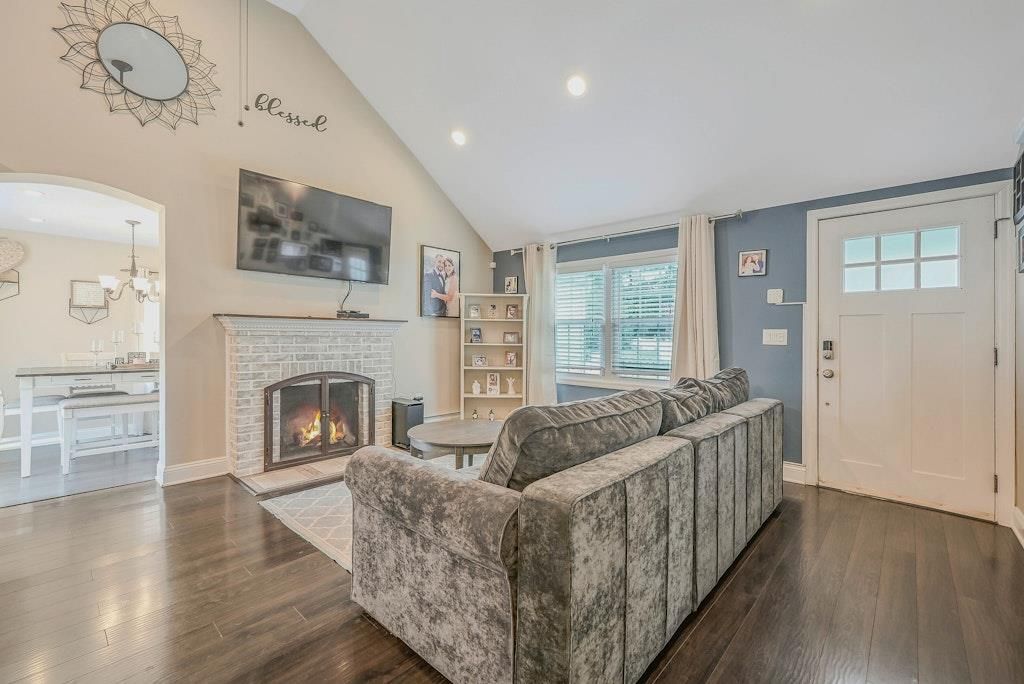 Chandelier, Dining room, Fireplace, Interior, Living room, Recessed Lighting, Wood Texture Flooring