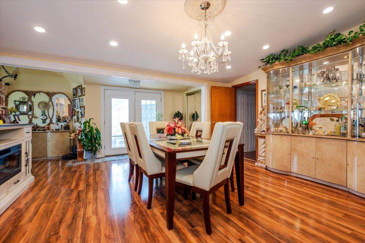 Chandelier, Dining room, Fireplace, Interior, Recessed Lighting, Wood Texture Flooring