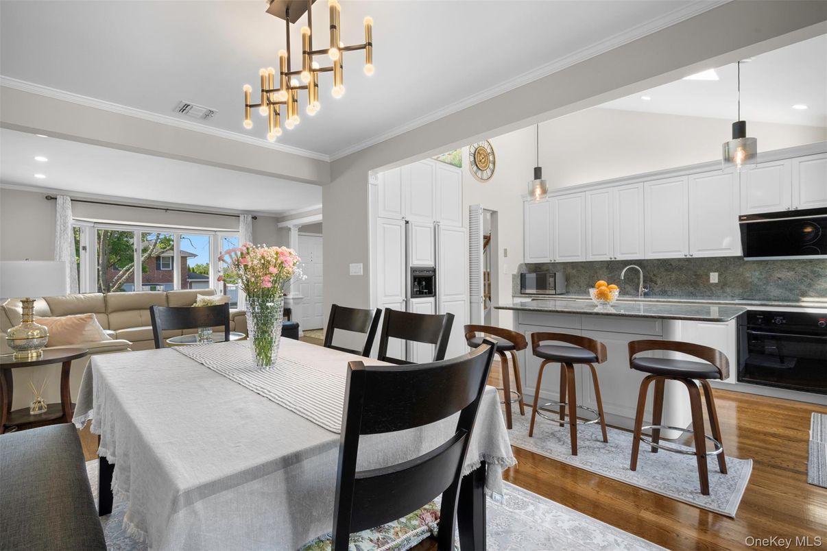 Dining room, Interior, Kitchen, Living room, Pendant Lights, Recessed Lighting, Stainless Steel Appliances, Wood Texture Flooring