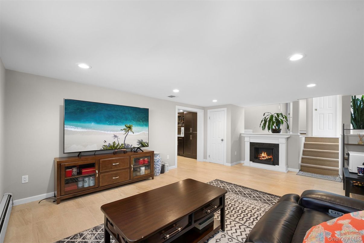 Fireplace, Interior, Living room, Recessed Lighting, Wood Texture Flooring