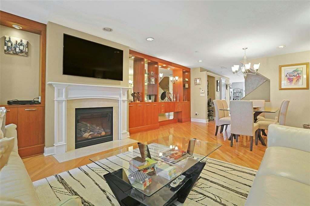 Chandelier, Dining room, Fireplace, Interior, Living room, Recessed Lighting, Wood Texture Flooring