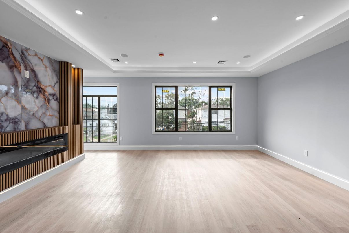 Empty room, Fireplace, Interior, Recessed Lighting, Wood Texture Flooring
