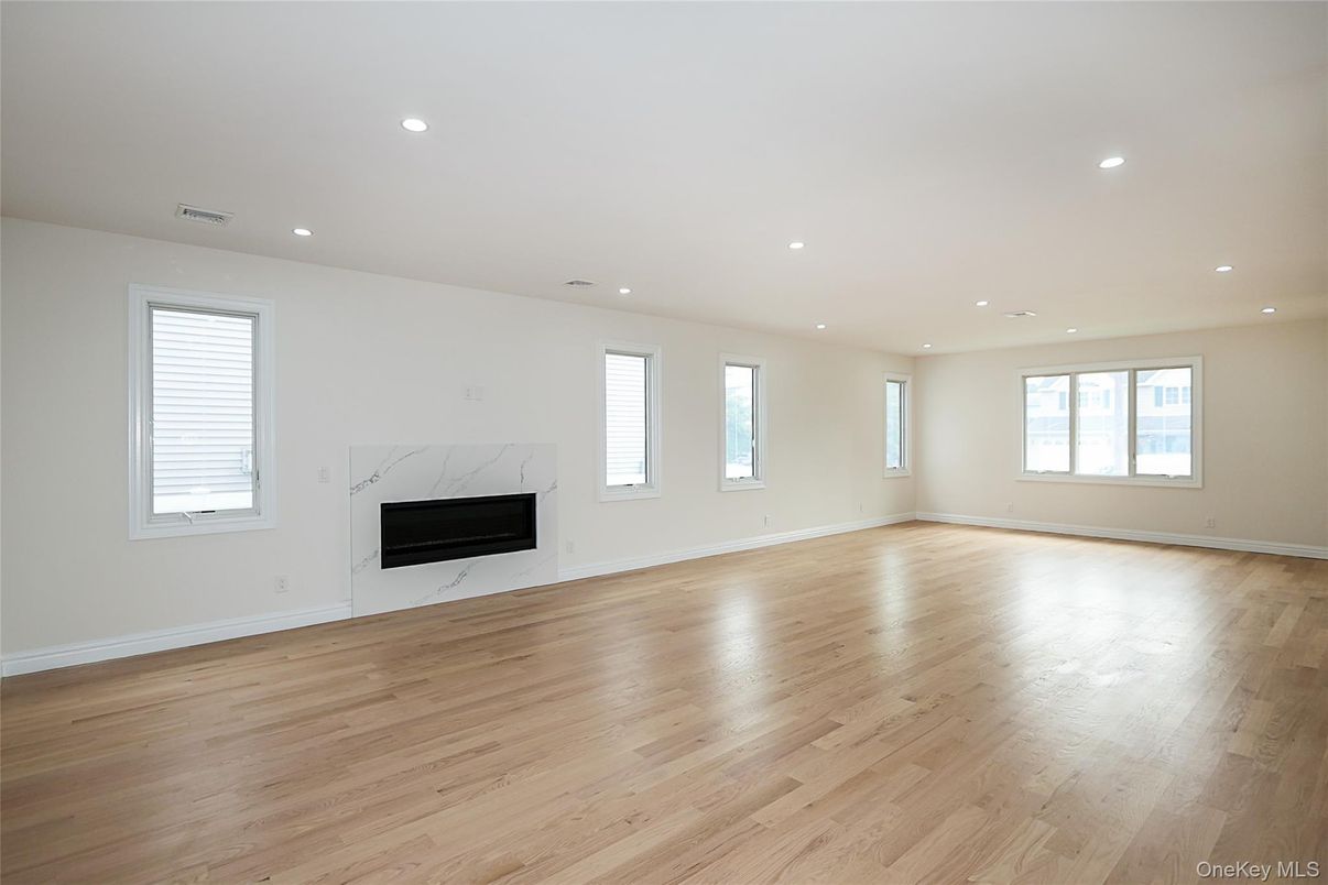 Empty room, Fireplace, Interior, Recessed Lighting, Wood Texture Flooring