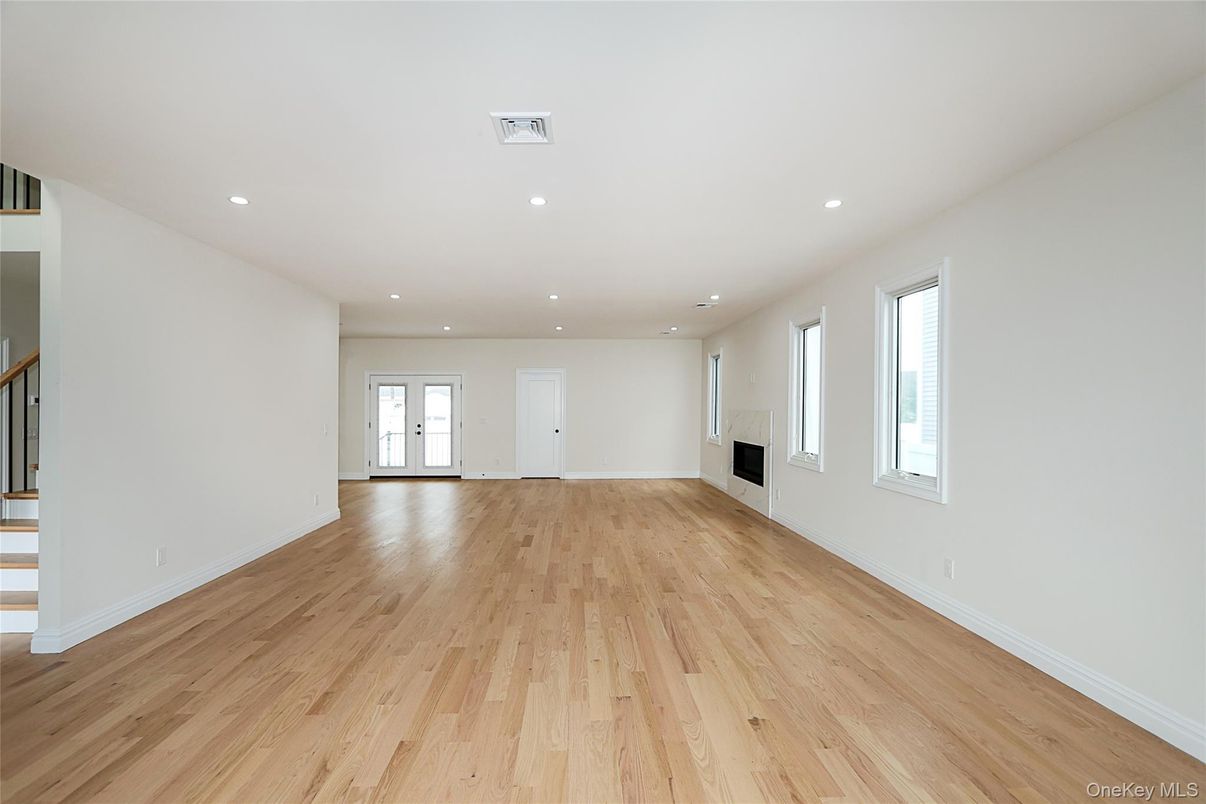 Empty room, Fireplace, Interior, Recessed Lighting, Wood Texture Flooring