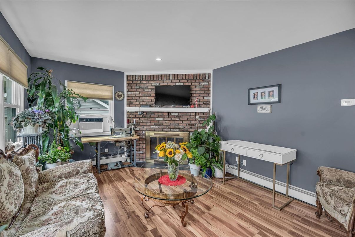 Fireplace, Interior, Recessed Lighting, Stone Walls, Wood Texture Flooring