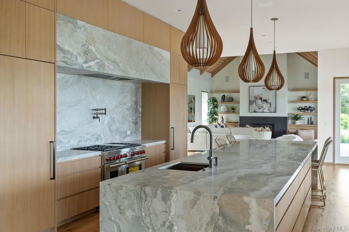Interior, Kitchen, Marble Walls, Pendant Lights, Recessed Lighting, Stainless Steel Appliances, Wood Texture Flooring