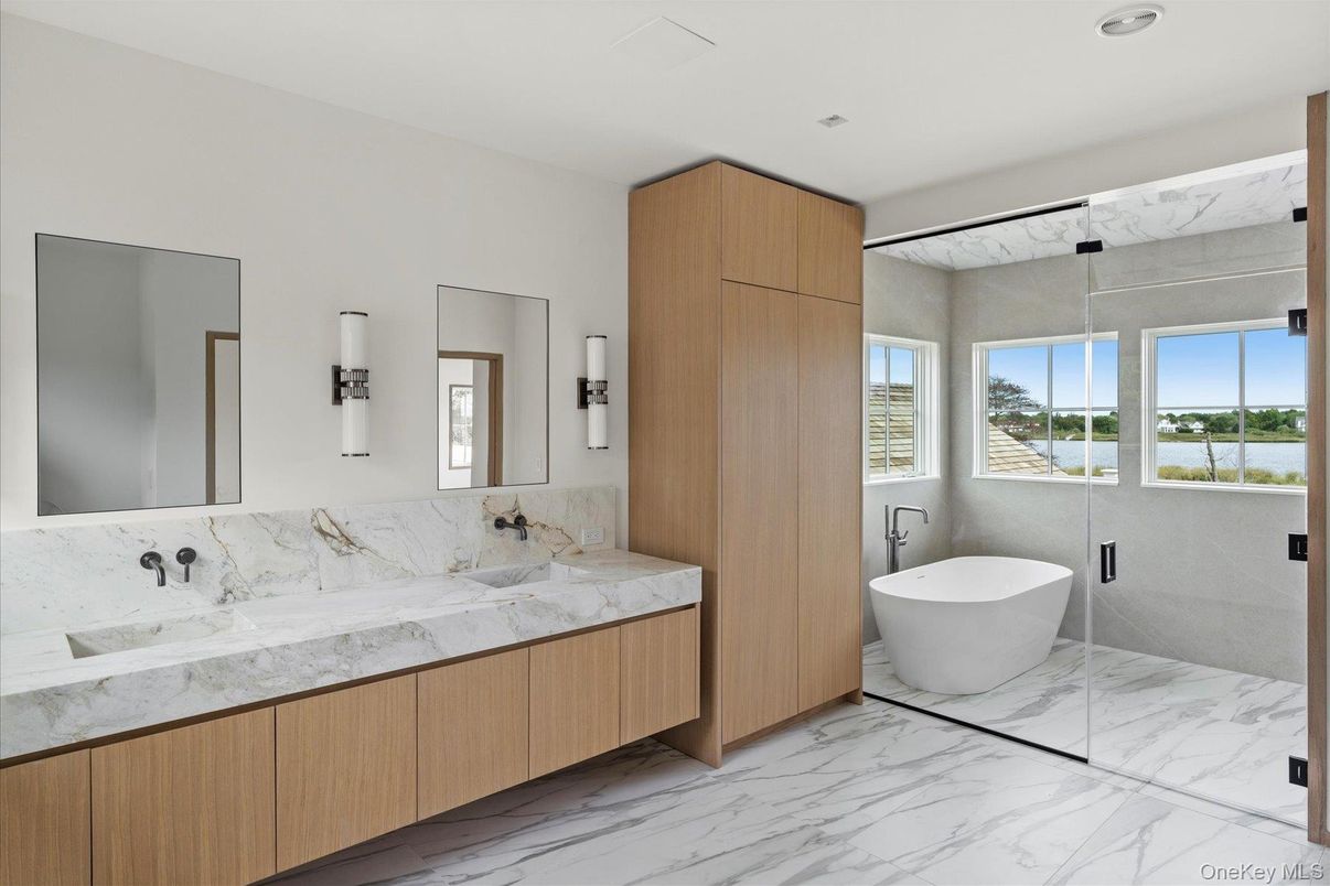 Bathroom, Dual Sink Vanities, Free Standing Baths, Interior, Marble, Marble Walls, Recessed Lighting