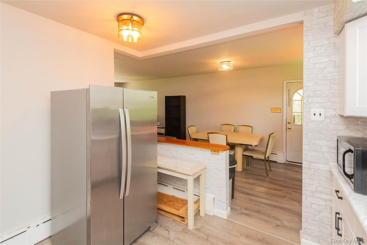 Dining room, Interior, Kitchen, Stainless Steel Appliances, Stone Walls, Wood Texture Flooring