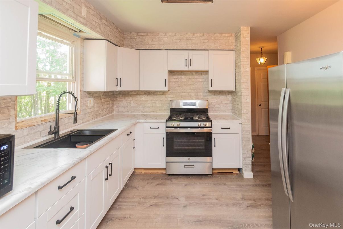 Interior, Kitchen, Pendant Lights, Stainless Steel Appliances, Stone Walls, Wood Texture Flooring